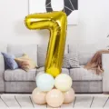 40 inch gold number 7 foil balloon with pastel balloon base for birthday party decor. - 40 Inch Gold Aluminum Foil Number Balloon 7