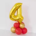 Gold number 4 foil balloon with red and gold balloon base for birthday party decor. - Gold Number 4 Balloon Column with Glue Dots and Ribbon