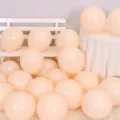 Thickened latex party balloons set for birthday celebration and festive holiday decoration. - Macaron Orange