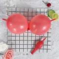 Macaron red tail balloons for party decoration and festive balloon chain setup supplies. - Macaron Red