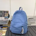 Sac à dos en toile bleue unie, cartable de style décontracté pour les voyages quotidiens. - Bleu