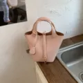Chic pink leather bucket bag for women, stylish handbag and crossbody bag for summer fashion. - No Pendant / Pink