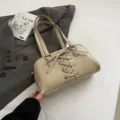 Chic beige PU leather underarm bag with stylish lace-up front design, ideal for daily autumn commuting. - Khaki