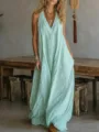 Vista detallada del vestido largo holgado verde menta sin mangas con bolsillos. - Verde claro