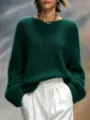 Detailed view of women's dark green crewneck loose long sleeve soft knit sweater top. - Dark Green