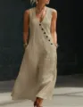 Casual sleeveless V-neck maxi dress featuring diagonal button closure and practical side pockets. - Khaki