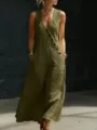Detailed view of the sleeveless v-neck maxi dress with asymmetric buttons in army green. - S / Army Green