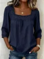 Close-up view of the dark blue square-neck blouse, highlighting the exquisite lace patchwork. - S / Navy Blue