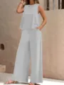 Solid color elegant two piece set featuring a round neck sleeveless vest and wide leg pants. - XS / Silver Gray