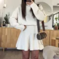 White knit two-piece set featuring long sleeve sweater and flared short skirt for women. - S / Set / White