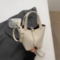 White leather bucket bag stylish commuter shoulder bag with top handle and metal lock closure. - No Pendant / Off White