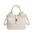 Classica borsa a secchiello bianco crema con chiusura a torsione in metallo e tracolla comoda. - Bianco senza ciondolo