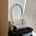 Minimalist Korean PU leather shoulder underarm bag for women with chic lace and pearl pendant. - With Charm / Blue