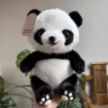 Vista detallada del tierno peluche de panda con suave pelaje y detalles en las patitas. - Panda desnudo / 25cm