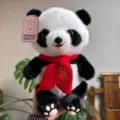 Cute panda plush toy detail showing soft fur, red scarf and premium hang tag decoration. - Panda with Scarf / 25cm