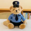 Lindo oso de peluche policía sentado con uniforme azul y gorra para regalo infantil - Oso de Policía Marrón / 25cm
