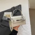 Women stylish PU leather shoulder handbag chic crossbody bag with metal lock charm - With Charm / White