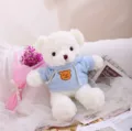 Lindo oso de peluche blanco con sudadera con capucha azul claro y detalle de parche. - Sudadera Azul / 30cm