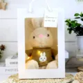 Cute plush rabbit toy inside white gift bag, brown knit sweater with cute bunny design. - Khaki Rabbit Mustard Yellow Gift Box / 30cm