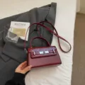 Dark red patent leather Kelly crossbody bag for women, stylish shoulder handbag with top handle. - No Pendant / Ankara Red