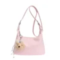 Trendy women pink shoulder bag 2026 new casual crossbody dumpling bag with cute plush bear pendant. - With Charm / Pink