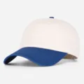 Gorra de béisbol bicolor con corona beige y visera azul, estilo streetwear informal para uso diario. - Azul marino