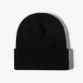 Classic black cuffed knitted beanie hat, warm winter solid color wool cap for men and women. - Black