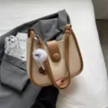 Trendy two-tone beige and brown shoulder bucket bag with cute plush eyeball charm accessory. - With Pendant / White and Khaki