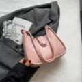 Trendy pink shoulder crossbody bag for women, versatile PU leather small handbag, casual style. - No Pendant / Pink
