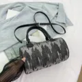 Stylish sequin cylindrical crossbody bag for women, versatile PU leather handbag with strap. - Black
