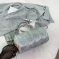 Stylish denim sequin barrel bag for women, versatile cylindrical shoulder and crossbody handbag. - Silver
