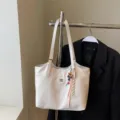 Stylish white PU leather tote bag, large capacity casual shoulder bag for women daily commuting. - With Pendant / Off White