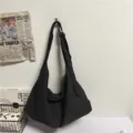 Casual black canvas shoulder bag for women, large capacity daily commuting hobo tote bag. - Black