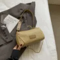 Chic straw woven cylinder shoulder bag with metal chain strap for stylish summer daily wear. - Khaki