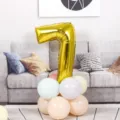 Gold number 7 foil balloon with pastel latex balloon base for birthday party decoration. - Number 7 / Gold