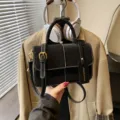 Black retro frosted women handbag, chic suede shoulder bag with metal buckle and stitching. - Black without Pendant