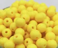 Detailed close-up of vibrant yellow acrylic round beads, perfect for DIY jewelry making. - 8mm Approx. 1750 Pcs / Yellow
