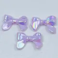Nahaufnahme von helllila Acryl-Schleifenperlen, schimmernde Macaron DIY Anhänger Accessoires. - 24*32mm / Lila