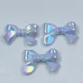 Detailed close-up of iridescent acrylic bow beads showing the vibrant color and center hole. - 24*32mm / Sky Blue