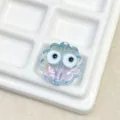 Schillernde UV-transparente Blumenperle mit Kulleraugen für DIY-Handyketten und Schmuck. - 20 mm (Loch 3 mm) / 5# Blau