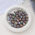 Detailaufnahme von 16mm Acryl AB Farbe feigenförmigen Perlen für DIY Schmuckherstellung. - 16 mm (Loch 3 mm) / Braun