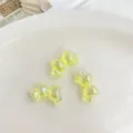 Primer plano de cuentas de lazo acrílicas iridiscentes, ideal para dijes de teléfono DIY y joyas lindas. - 14.5x27.5mm (Orificio 3.5mm) / Amarillo