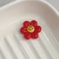 Red smiley flower resin charm, cute cabochon for DIY jewelry, bracelet and hair clip making. - Red