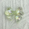 Green iridescent bow acrylic DIY charm, perfect for summer handmade bracelets and jewelry. - Translucent Green