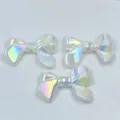 Close-up of iridescent acrylic bow beads, colorful holographic DIY craft accessories for phone charms. - 24*32mm / White