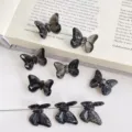 Black acrylic faceted butterfly beads with back holes for DIY hair accessories and jewelry. - Black