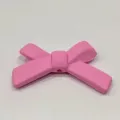 Vista dettagliata del fiocco rosa, ideale per ciondolo custodia e decorazione accessori. - Fiocco / Rosso rosa