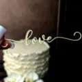 Gold acrylic love cake topper detail shot, elegant romantic party dessert decoration accessory - Style 2 / Width approx 12cm / Gold