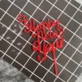 Red acrylic Happy New Year cake topper with stars, perfect for New Year party dessert decor. - Red Happy New Year Lettering