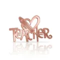 Detailed close-up of rose gold acrylic TEACHER cake topper with heart and pencil design. - Heart Pencil Style